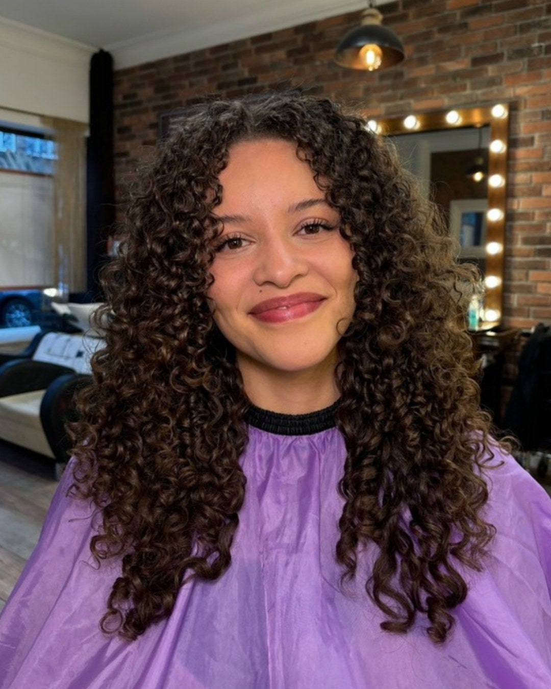 Babeyhair client with long defined curls